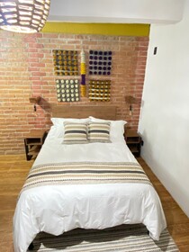 Suites Del Barrio Hotel
