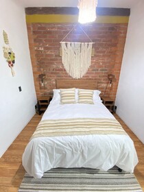 Suites Del Barrio Hotel