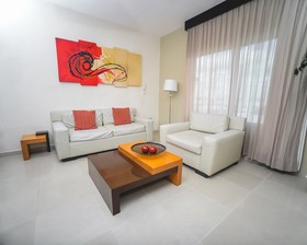 Encanto Riviera Condo Hotel