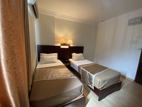 Capital O 89658 Bustani Hotel