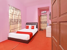 Capital O 90664 Rabi Hotel