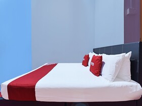 Capital O 90664 Rabi Hotel