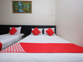 Q Hotel by OYO Rooms