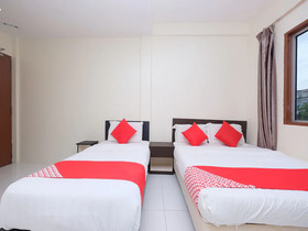 Q Hotel by OYO Rooms