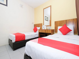 Sun Triang Hotel by OYO Rooms