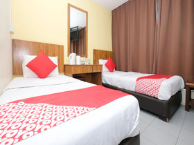 Sun Triang Hotel by OYO Rooms