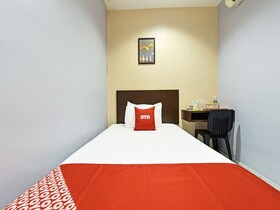 M Three Hotel by OYO