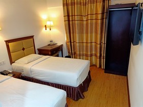 Oyo 90464 Borneo Suites Hotel