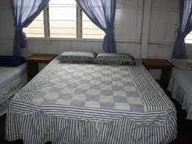 Emma Guest House Rumah Rendah