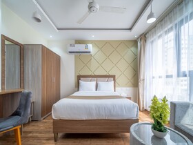 OYO Townhouse 156 Rose Hotel Apartments