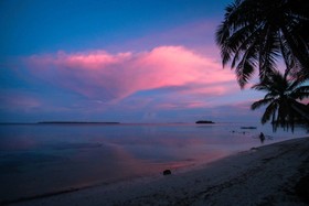 Surfing Carabao Beach Houses