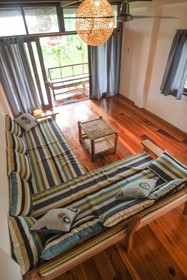 Surfing Carabao Beach Houses