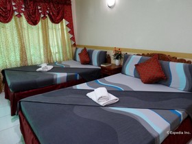 D'Lucky Garden Inn & Suites