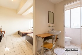 Golden Panda Dormtel by ZEN Rooms