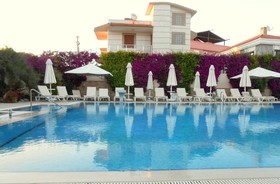 Kamer Suites & Hotel