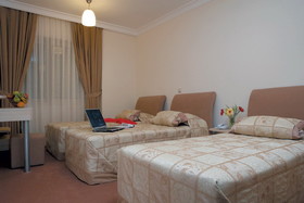 Kamer Suites & Hotel