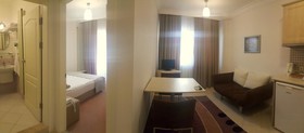 Kamer Suites & Hotel