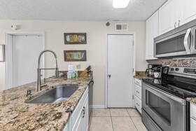 Harbor Place Condominiums by Hosteeva