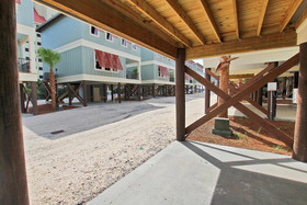 Hammock Dunes A by Youngs Suncoast