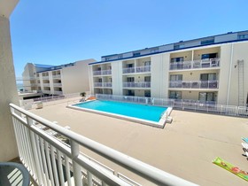 Sugar Beach by Youngs Suncoast