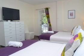 Grand Palm Plaza - Gay Men's Resort