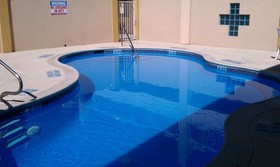 Texas Inn & Suites - City Center at UTRGV
