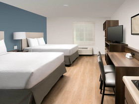 WoodSpring Suites Signature Las Colinas