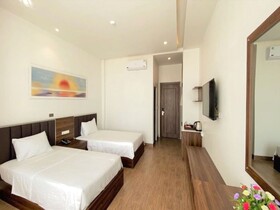Capital O Bee Hotel
