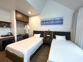 Capital O Bee Hotel