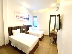 Capital O Bee Hotel