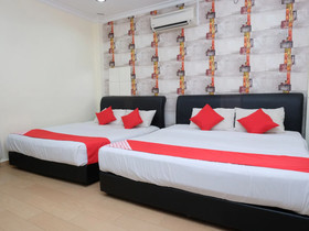 Aj Suite Hotel by OYO Rooms